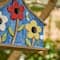 Glitzhome® 15" Blue Distressed Wood Birdhouse with Flowers
